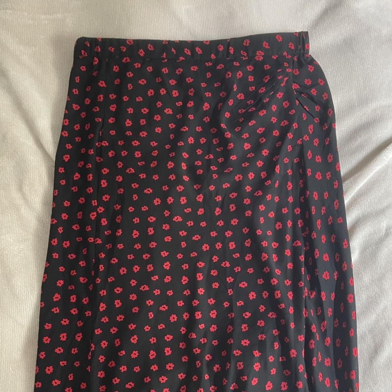 black midi skirt with red flowers from princess... - Depop