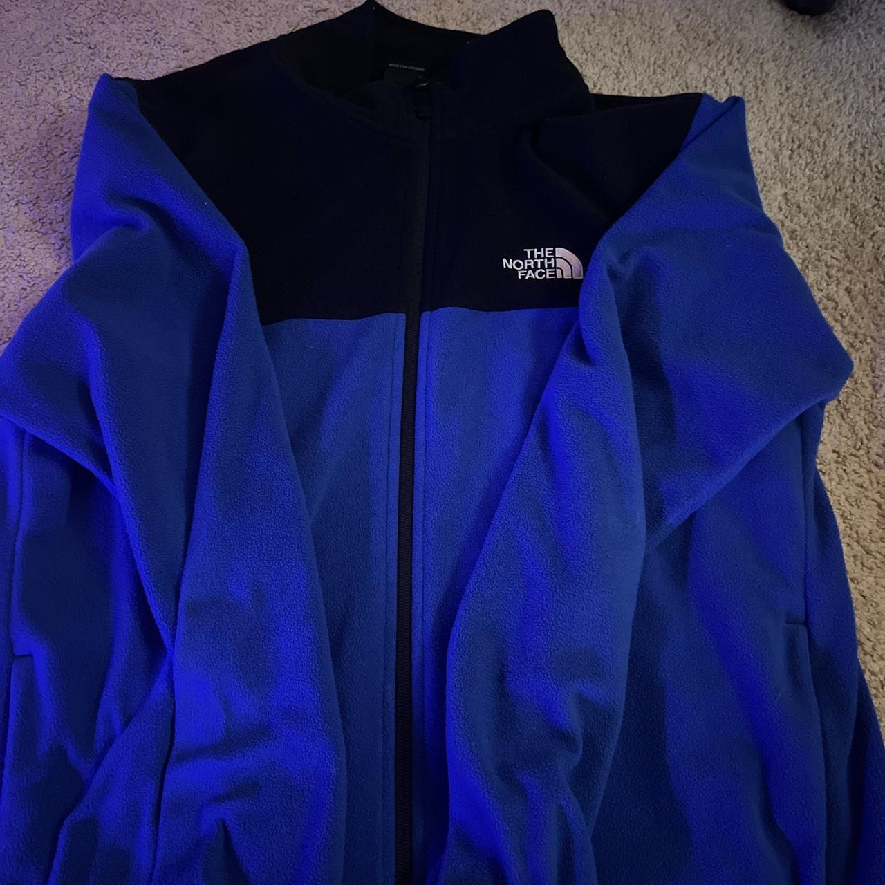 Blue and black north face fleece, super super... - Depop