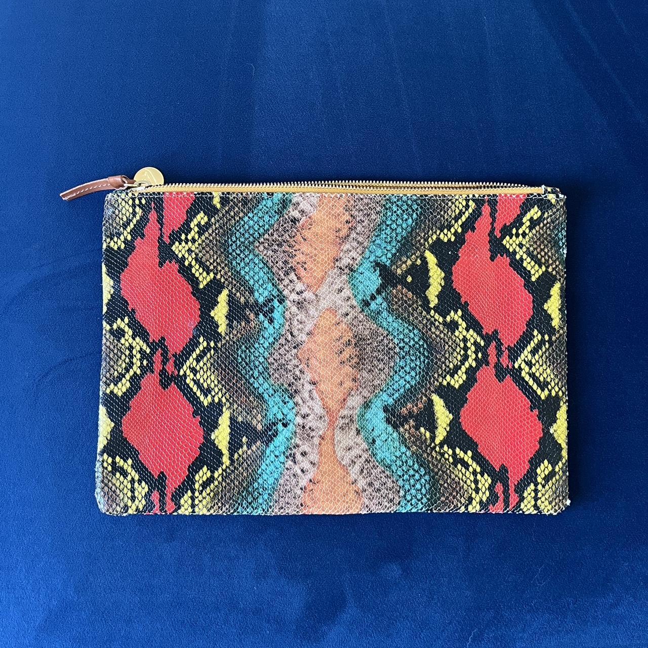 authentic gold distressed clutch labelled CLARE - Depop