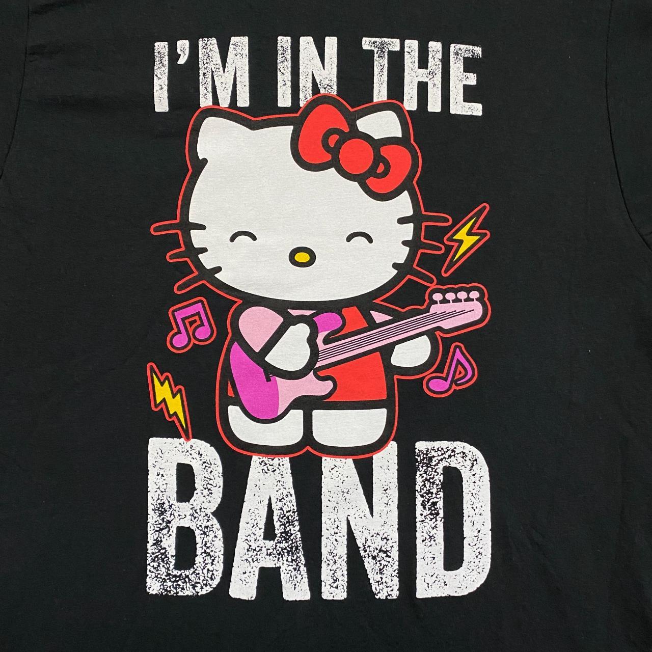 white Hello Kitty design t-shirt with four tiny - Depop