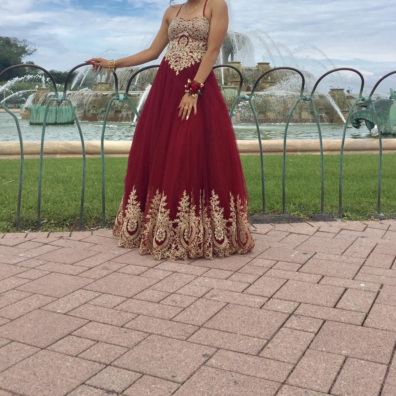 Prom dress. Maroon red dress with detailing on the