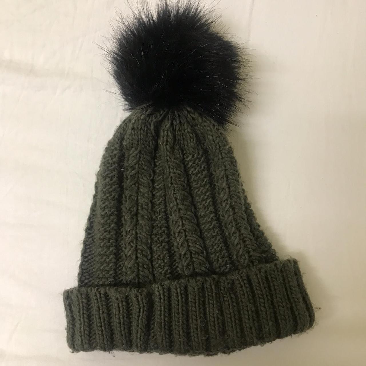 Forest green bobble hat, in really good condition,... Depop