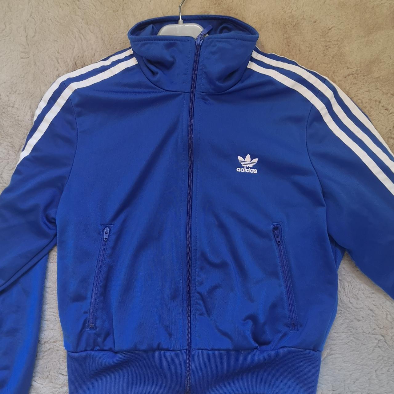 Blue Adidas women's zip up tracksuit top, worn only... - Depop