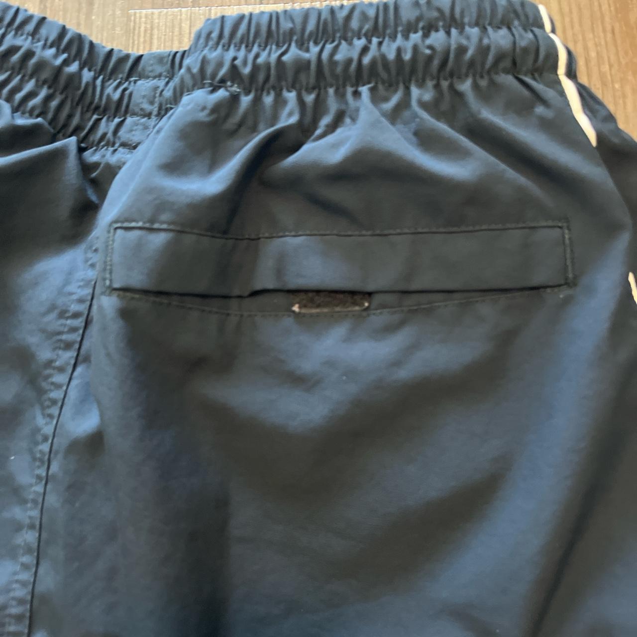 medium navy blue nike track pants has been worn... - Depop