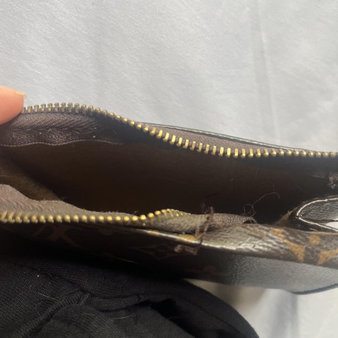 Real LV wallet Send offers!! It looks scratches - Depop