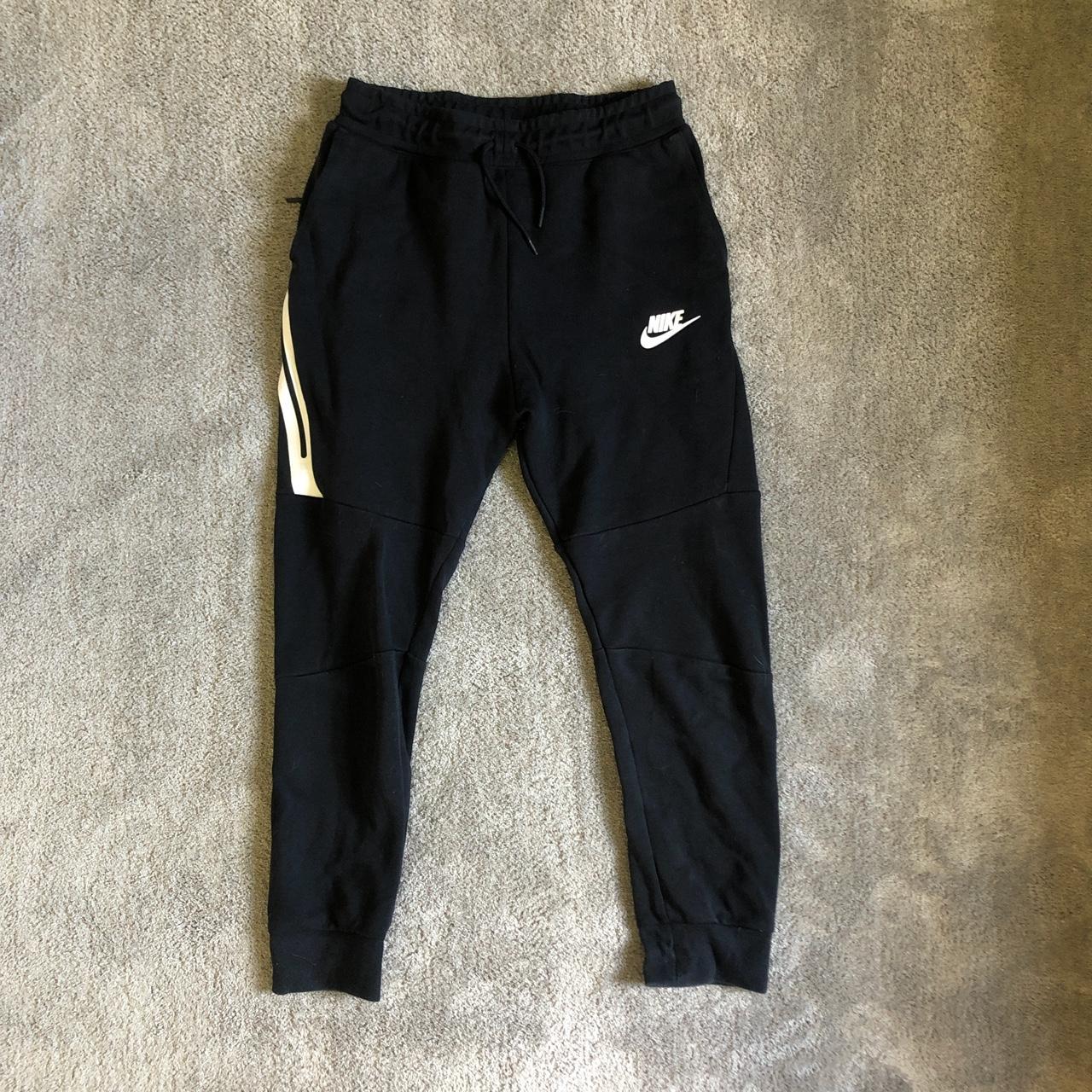 Kids large Nike trackies great condition! Would fit... - Depop