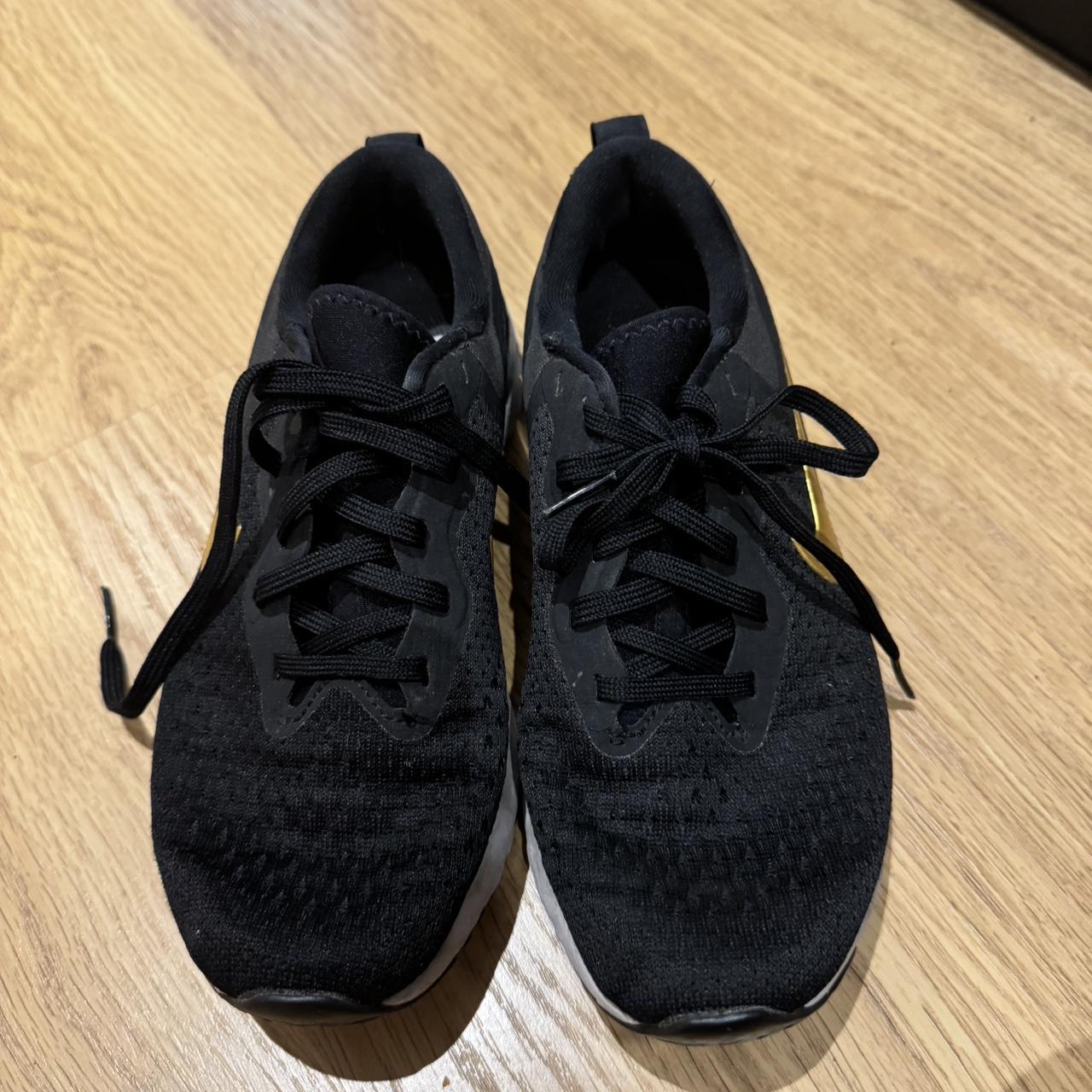 nike odyssey react women's black and gold