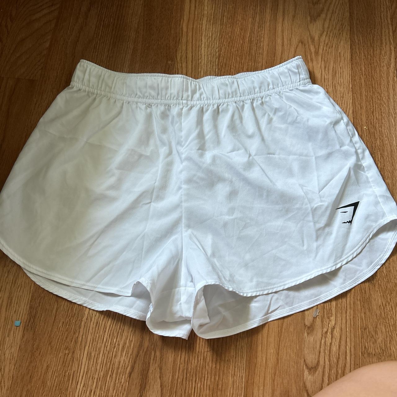 white gymshark shorts small see through... Depop