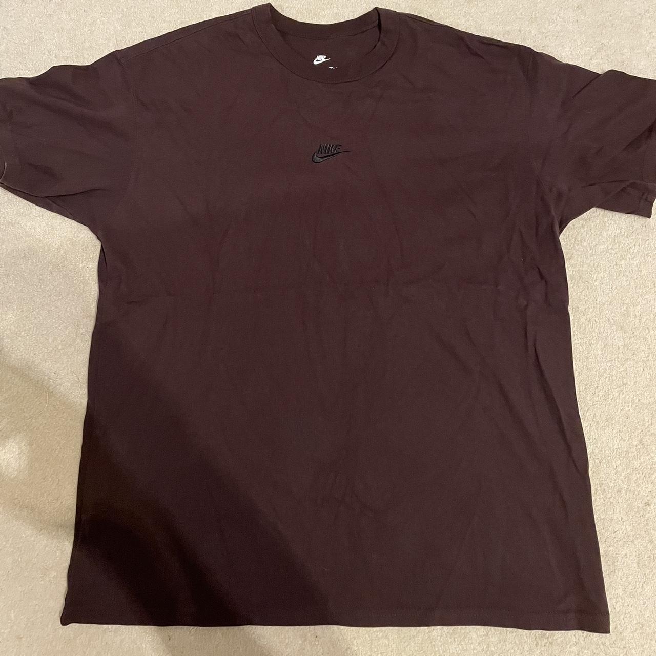 burgundy and black nike shirt