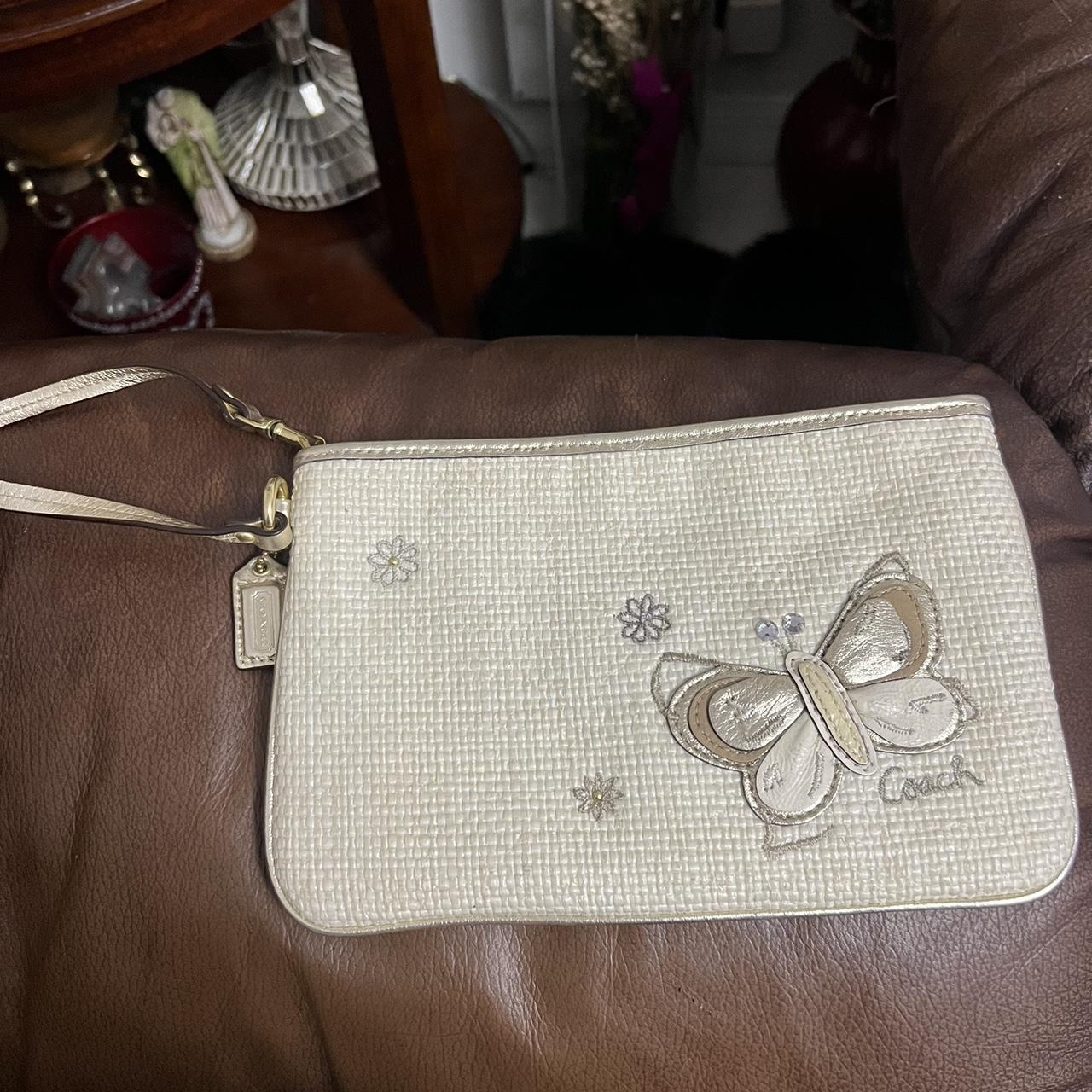 Coach butterfly best sale cosmetic bag