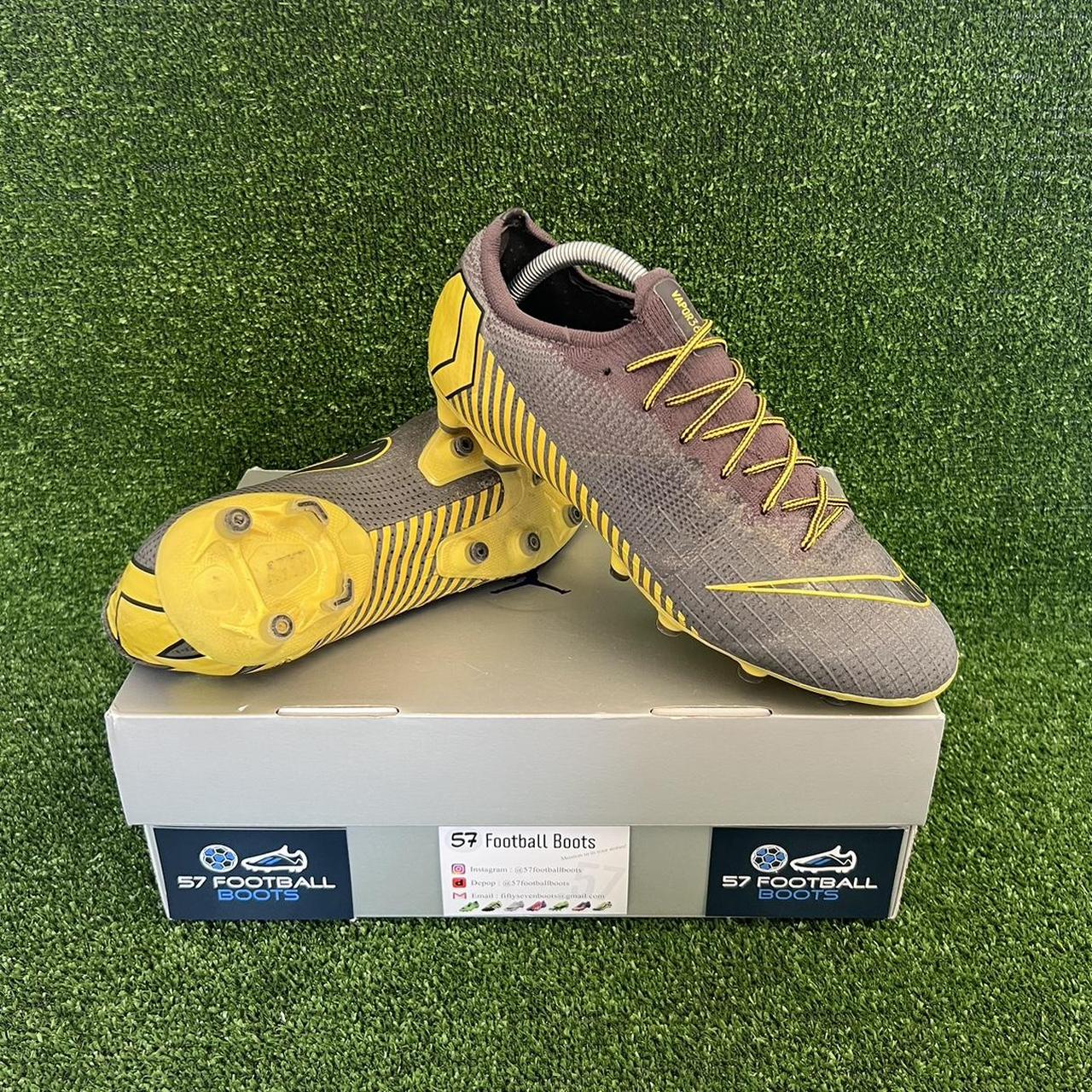 grey and yellow nike boots