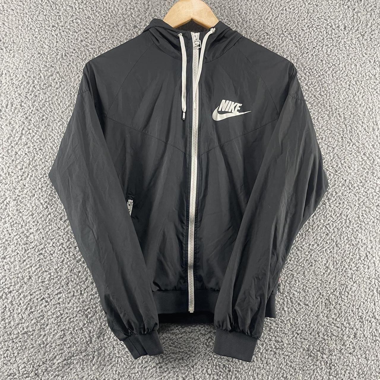 Nike windbreaker size medium, String loop on hood is