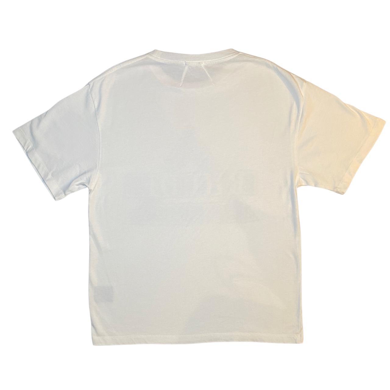 Item: RHUDE oversized triangle tee Depop