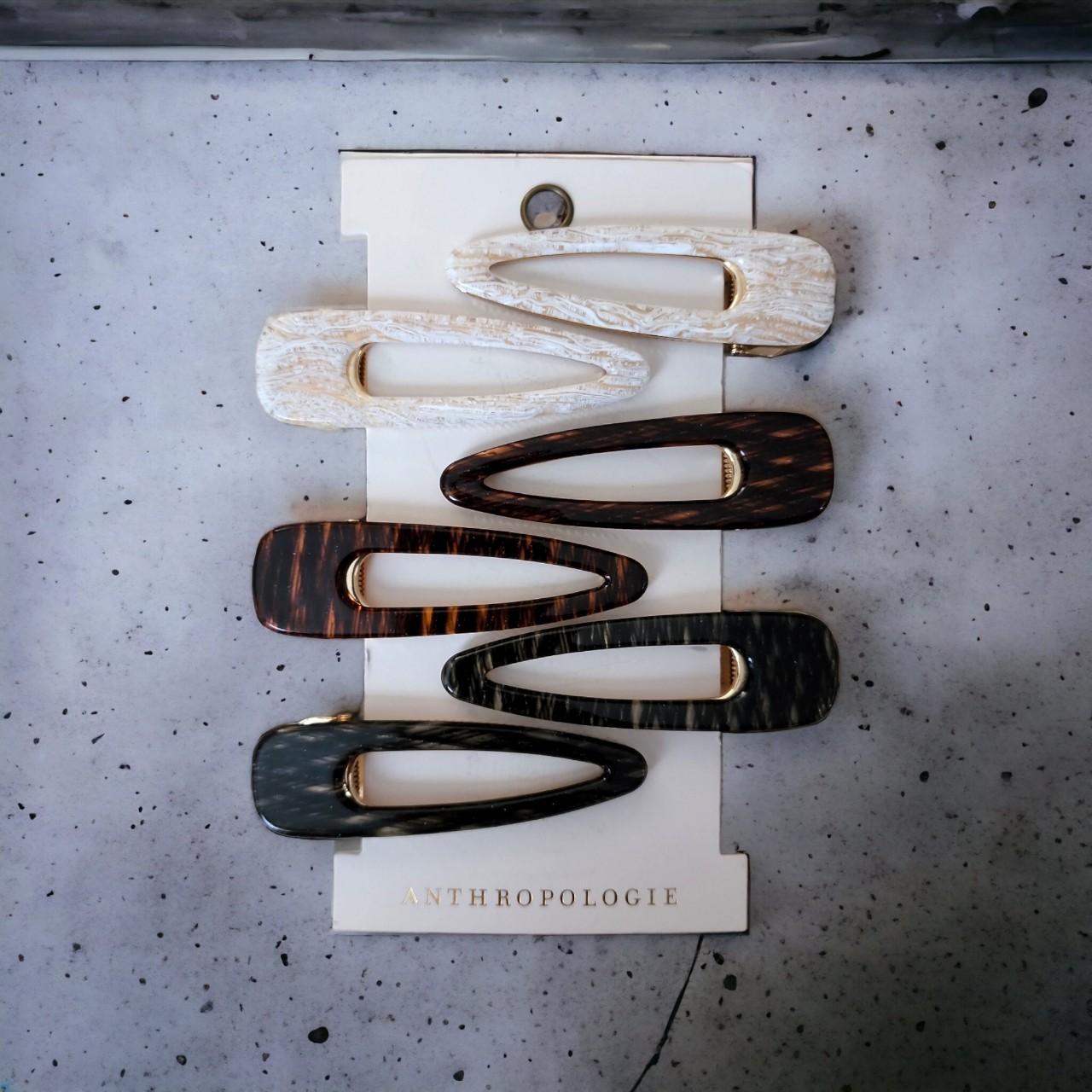 ANTHROPOLOGIE Resin Clip Set. Comes with six clips.... Depop