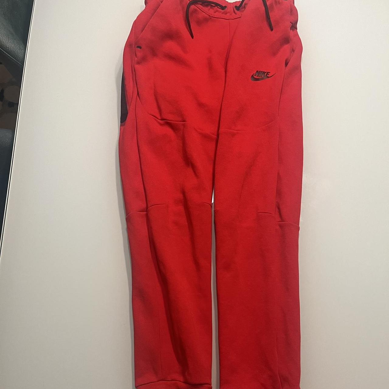 red nike tech pants
