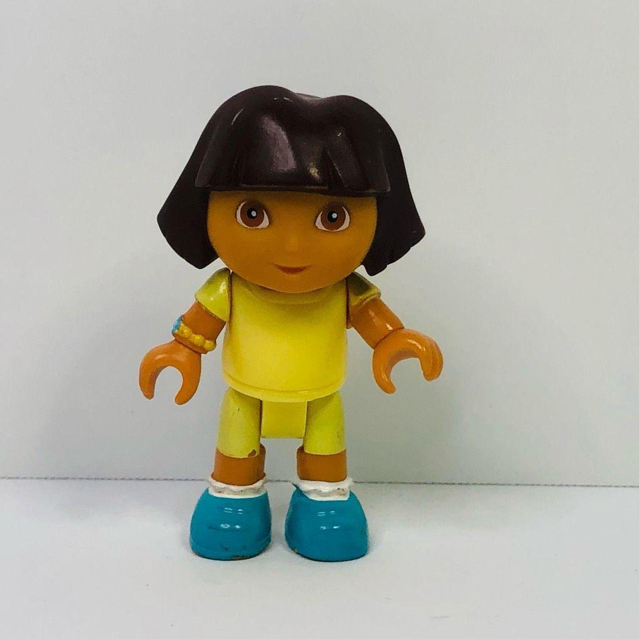 mega bloks dora the explorer figure yellow outfit... - Depop