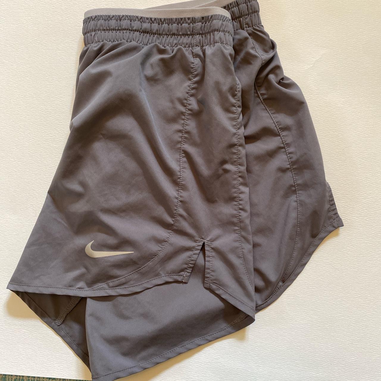 grey nike shorts with zip pockets
