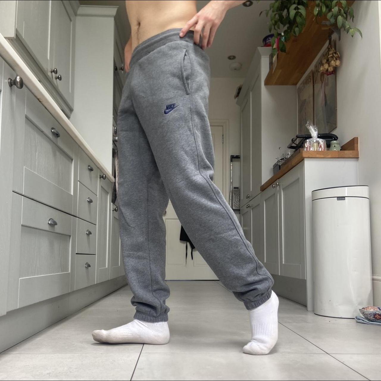 Grey Nike Joggers with adjustable drawstring waist... Depop