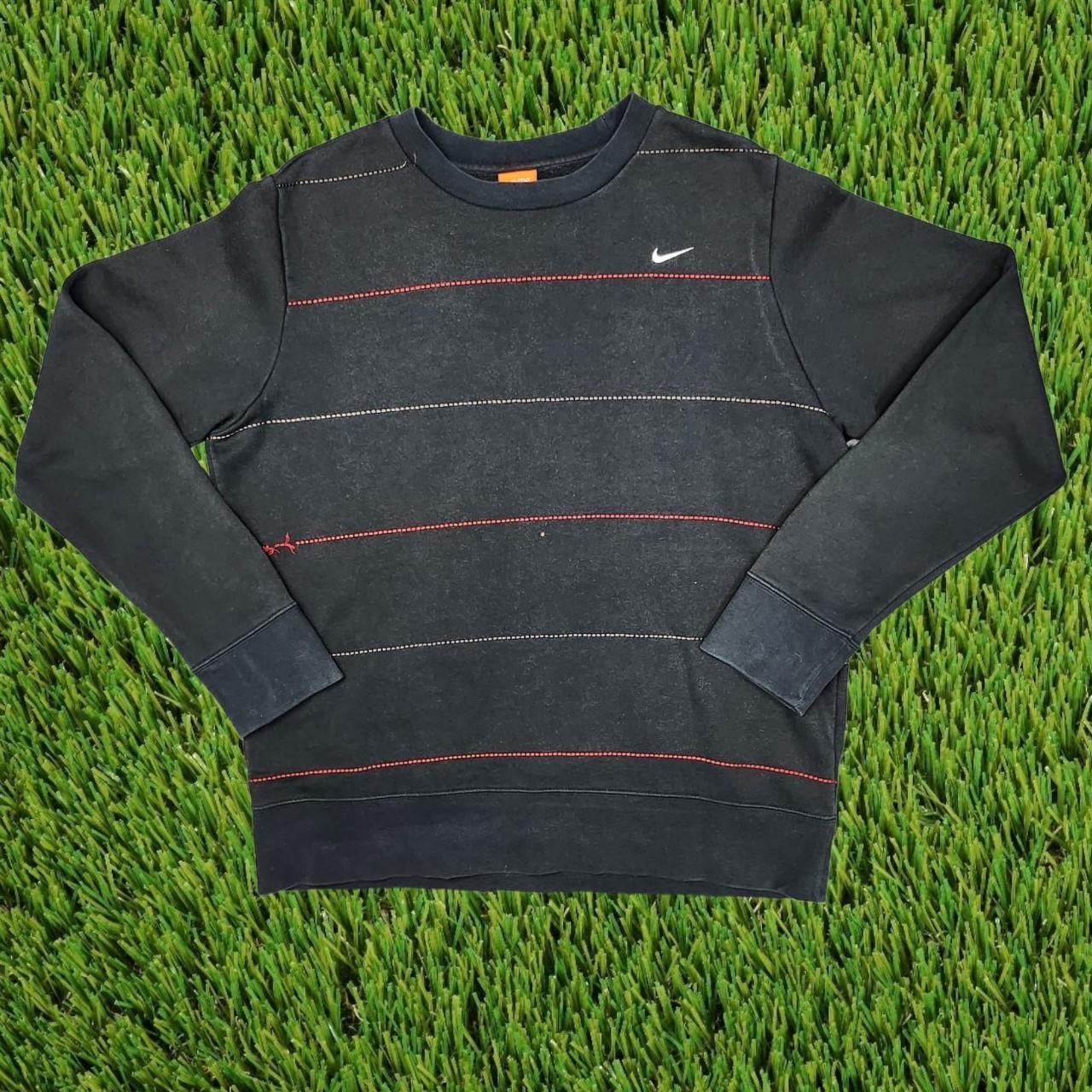 black nike sweatshirt with red tick