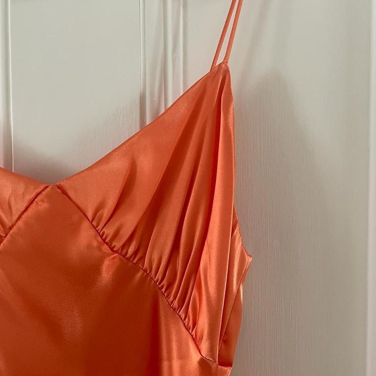 The line by k satin asymmetrical orange slip dress... Depop