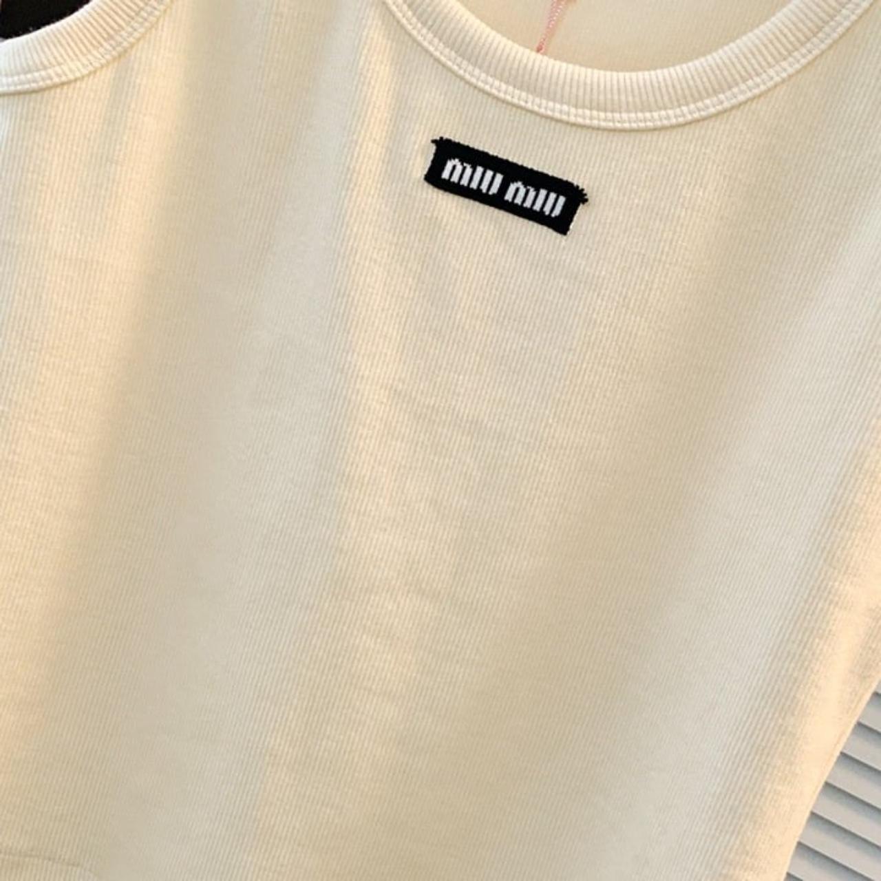 miumiu tank top S Never worn open to | Depop