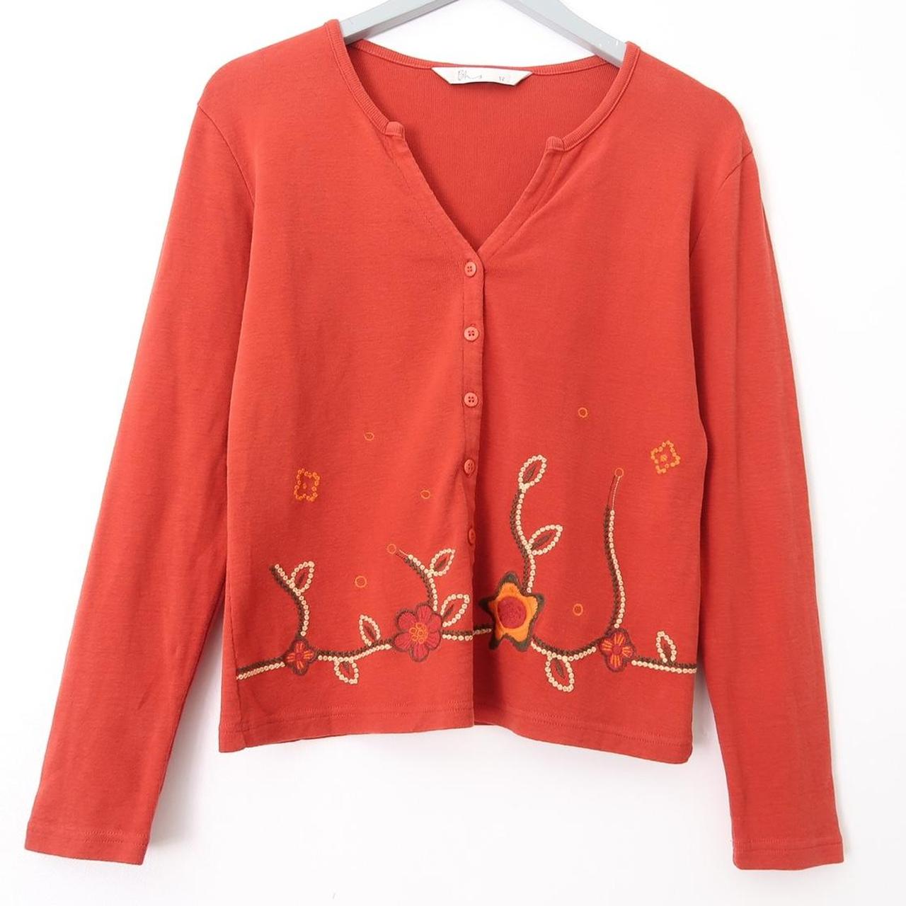 Orange button up cardigan top. Embroidered floral