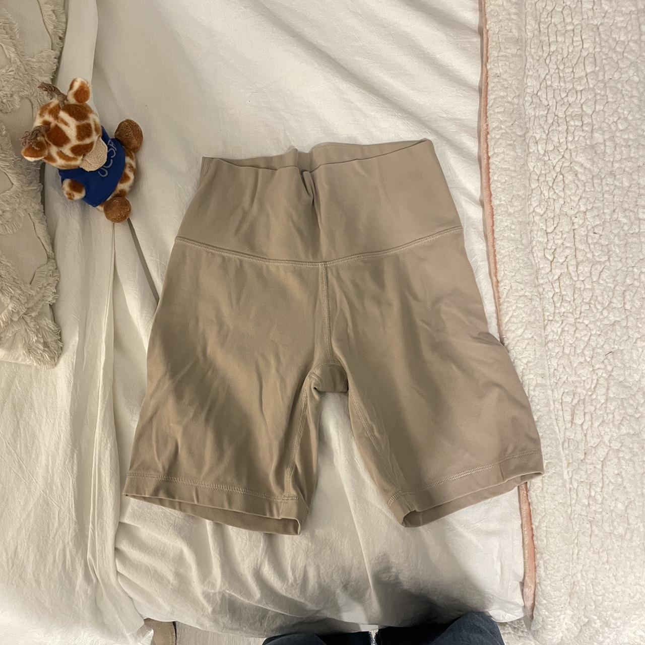 aritzia tna biker shorts beige color size small worn... Depop