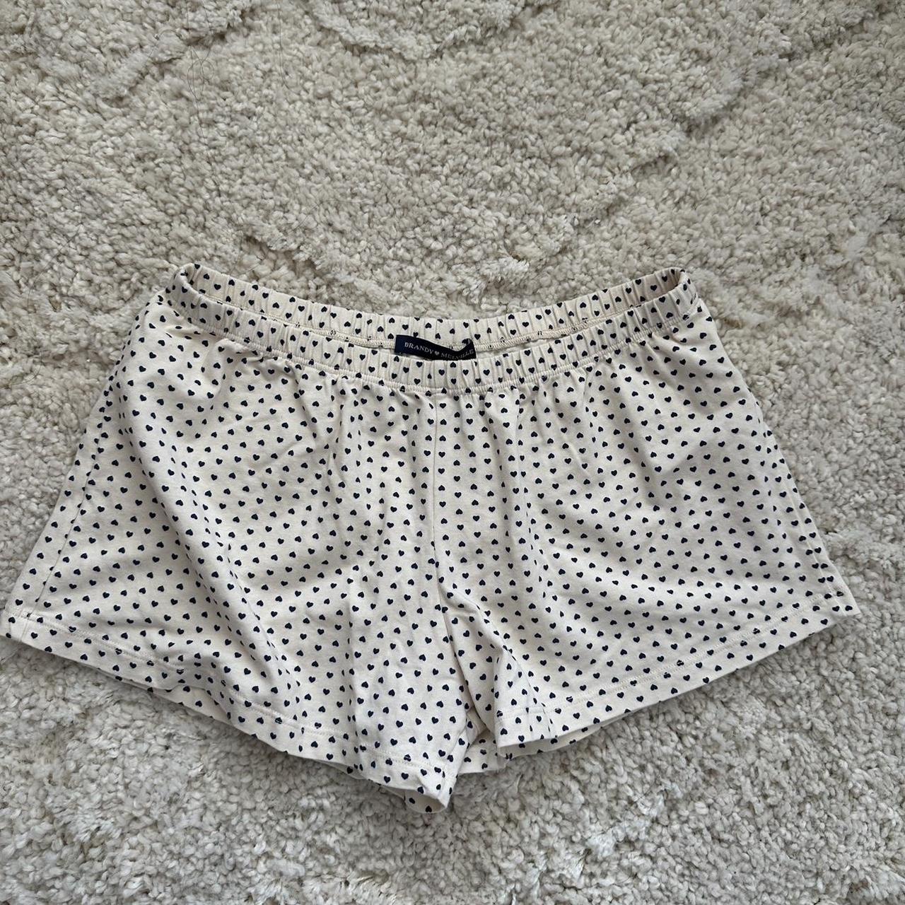 Brandy Melville white with blue heart shorts - Depop