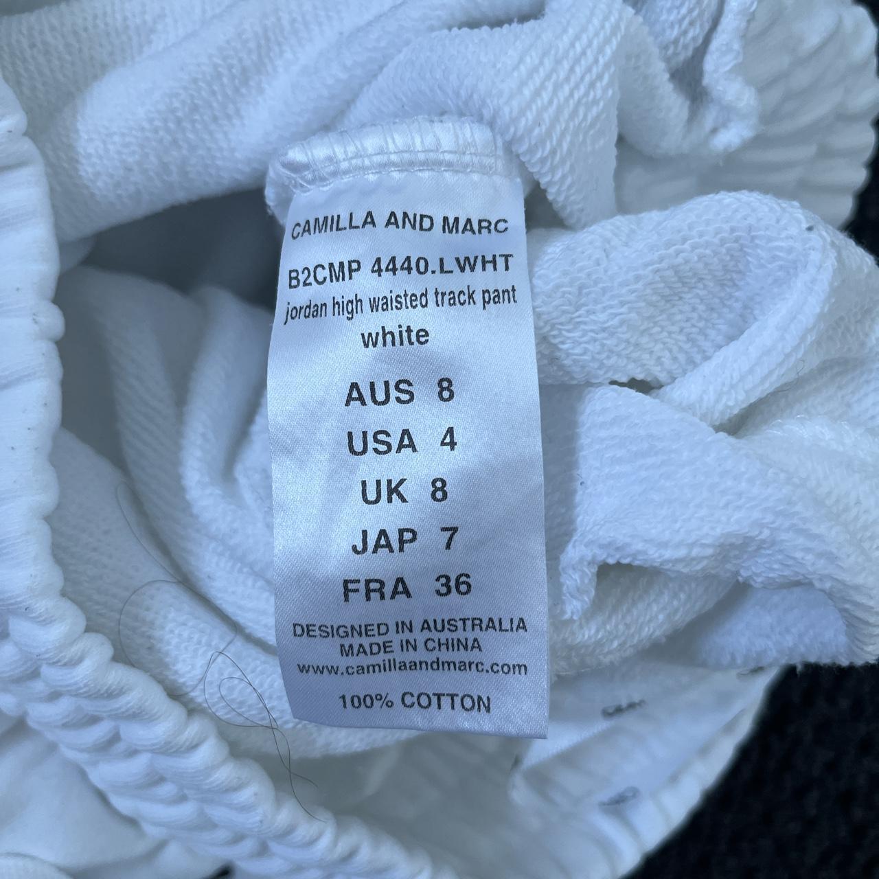 Camilla and Marc C&M White track Depop