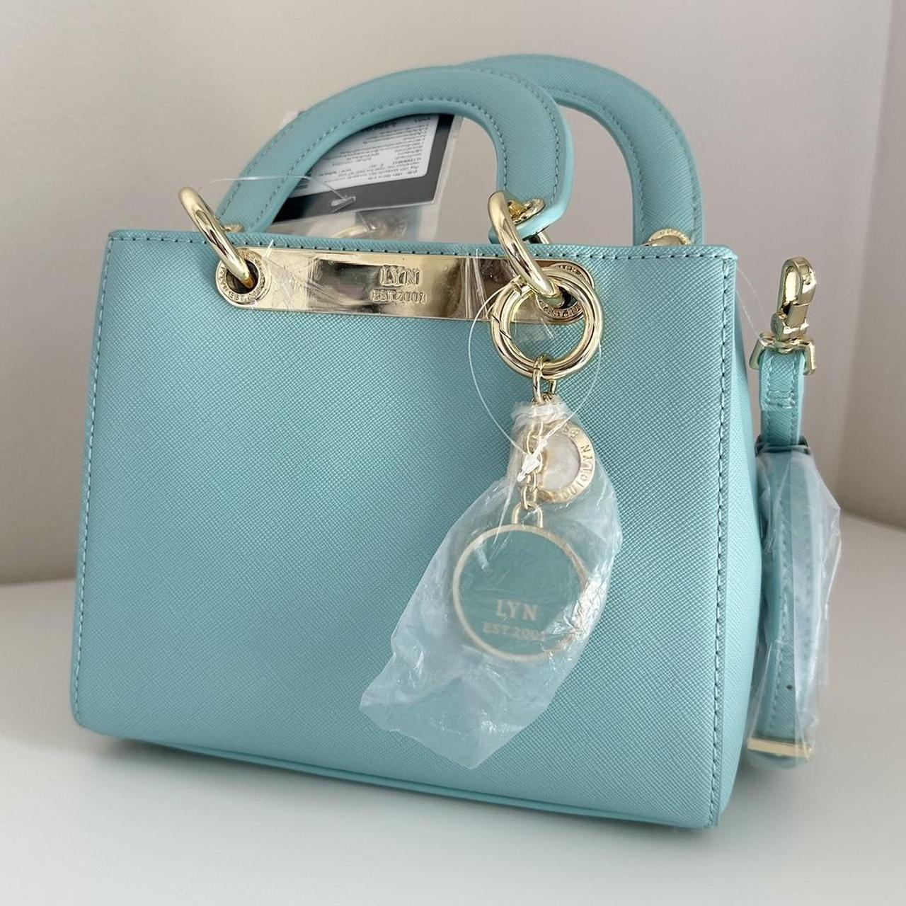 CHANEL Coin Purse Tiffany Blue Caviar with Light Gold Hardware 2018 at  1stDibs | chanel tiffany blue bag, tiffany blue purse, tiffany coin purse