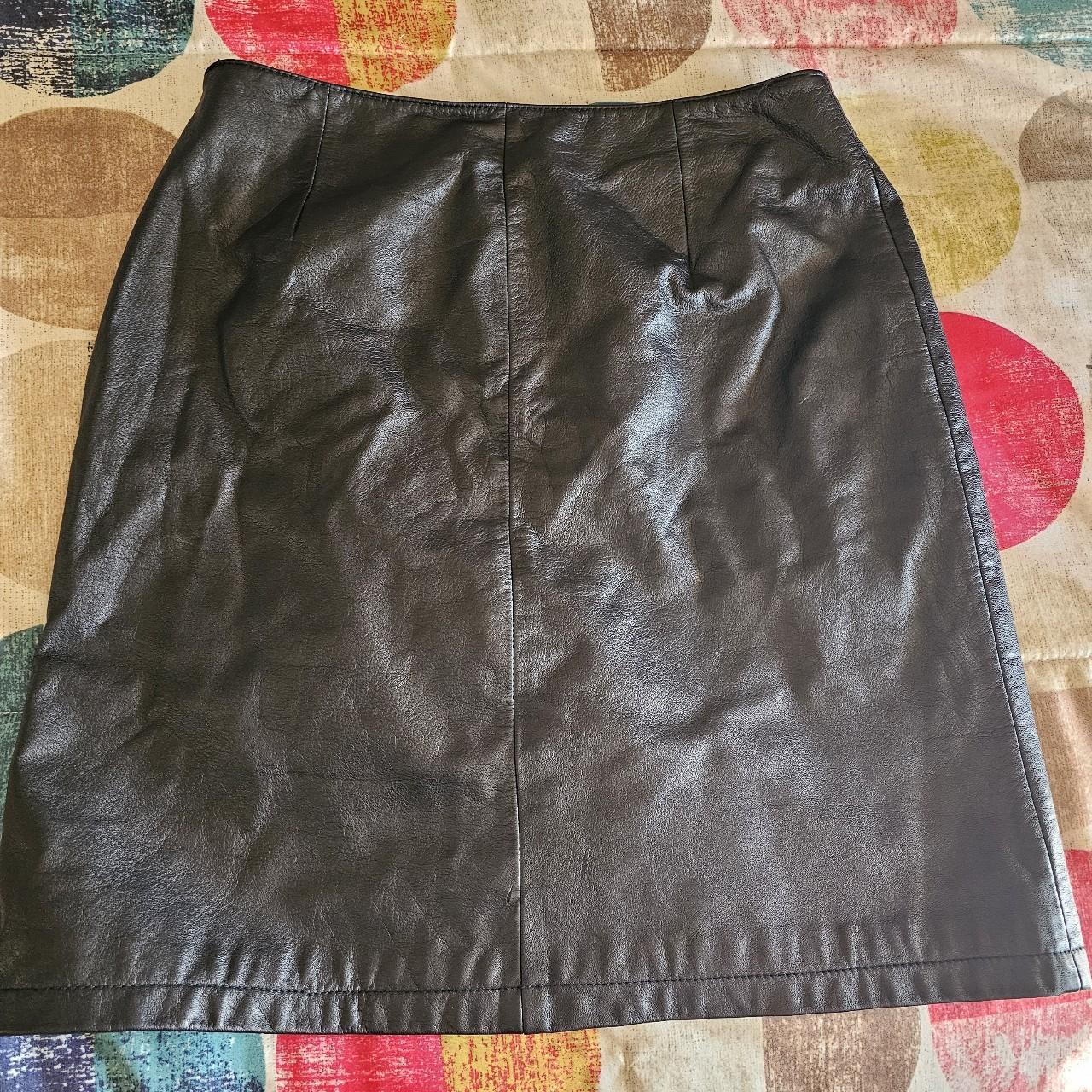 size m/l black wilson leather skirt #vintage... - Depop