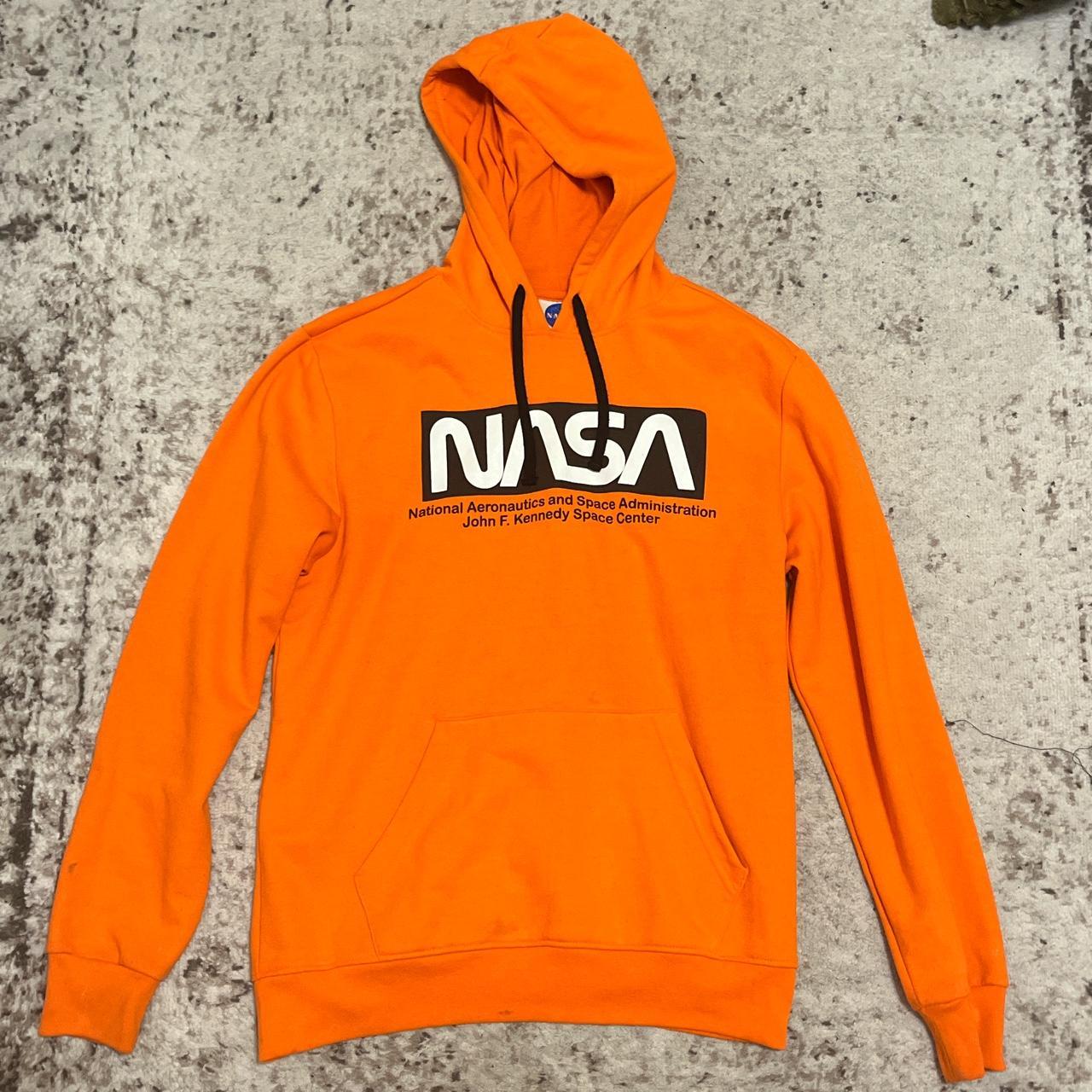 Orange NASA hoodie with black accents. Original from... - Depop