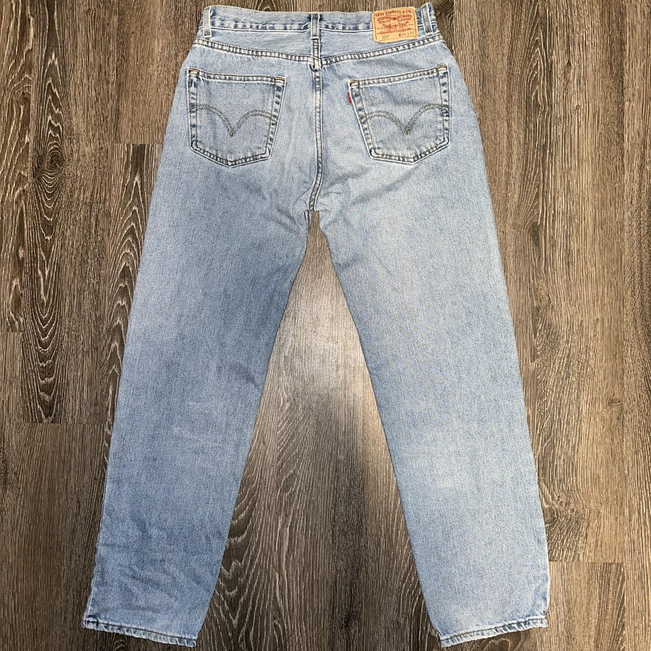 Levis 550s relaxed fit jeans in a light blue wash in... - Depop