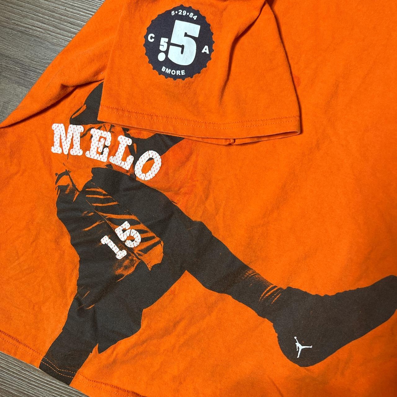 Black and best sale orange jordan shirt