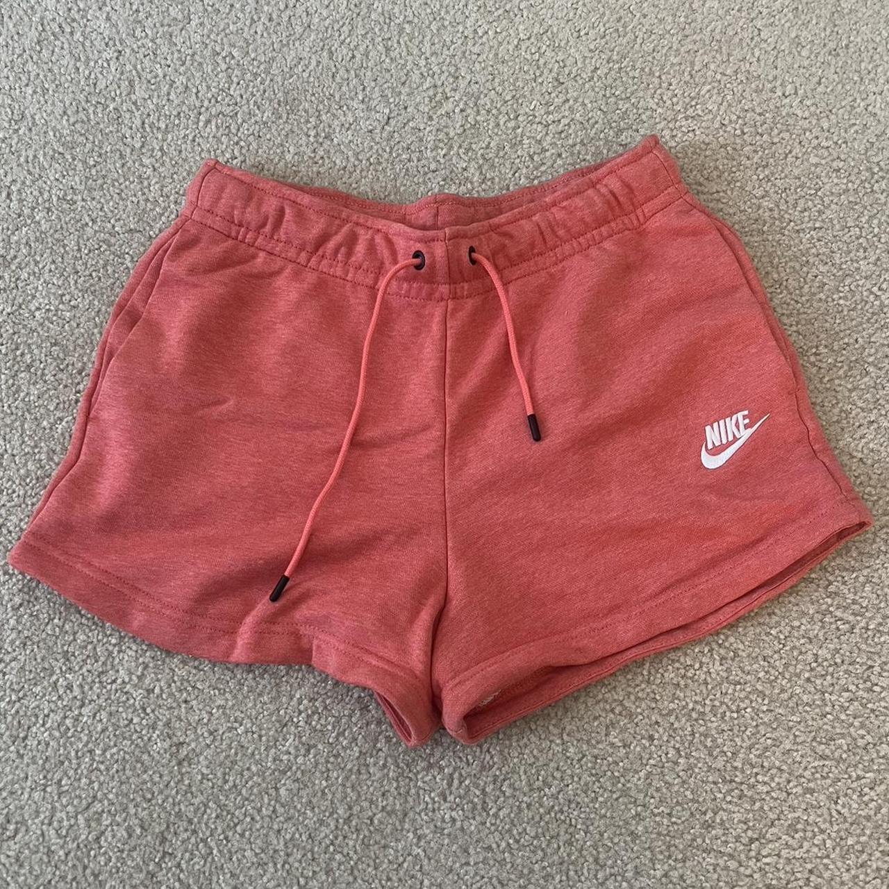 Nike pink sweat on sale shorts