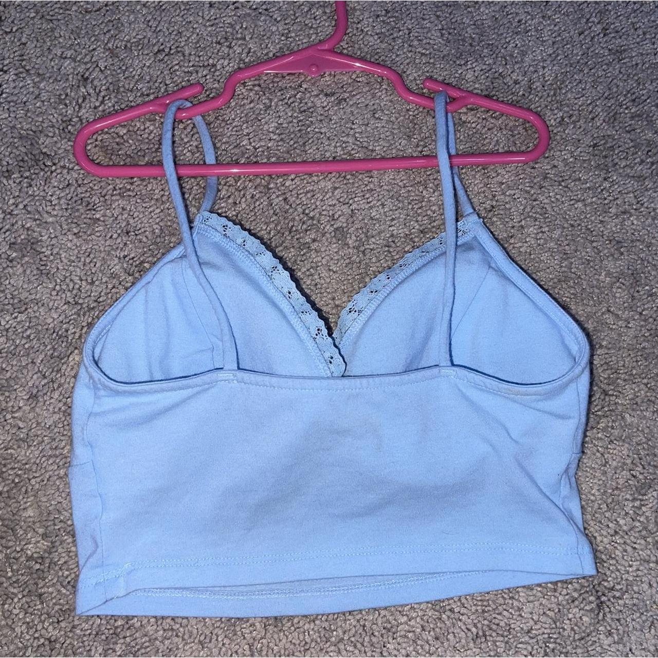 baby blue cropped top padding in the chest area... Depop