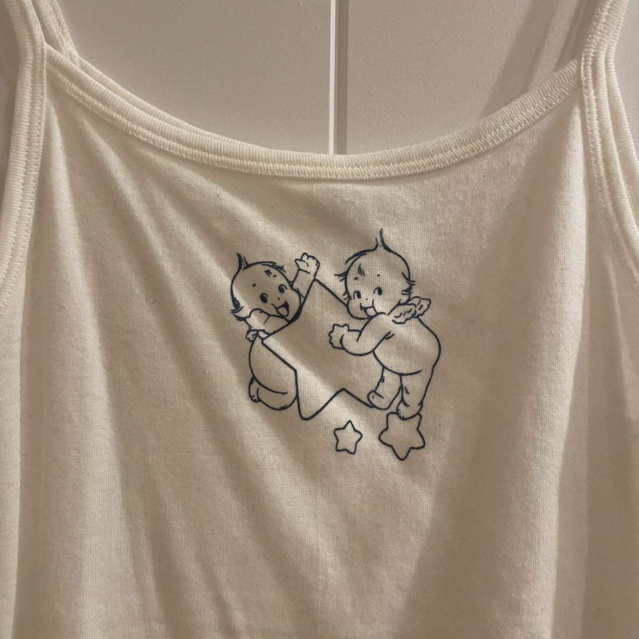 Brandy Melville cute baby and stars white tank top... Depop