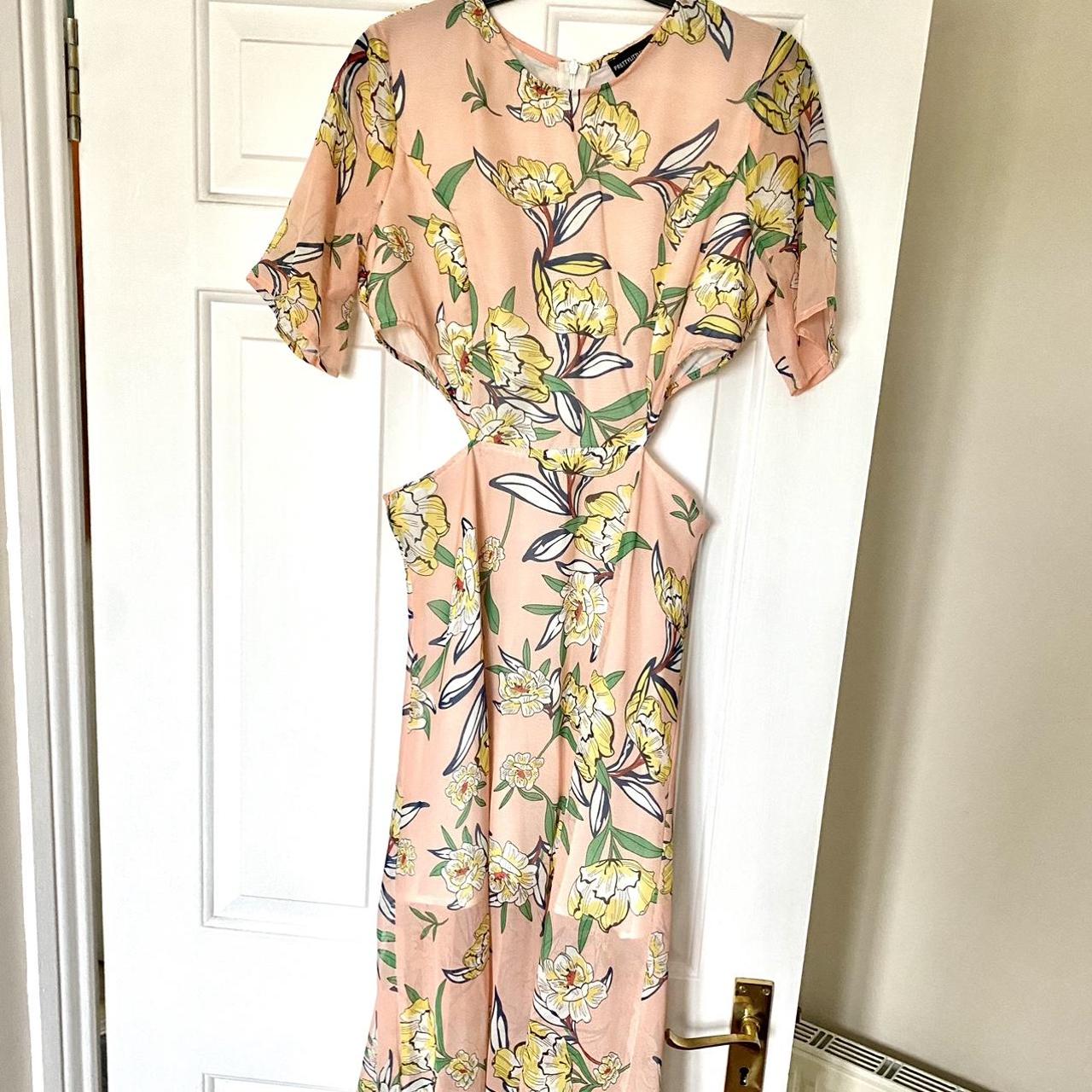 Pretty little thing floral dress With cut out sides - Depop