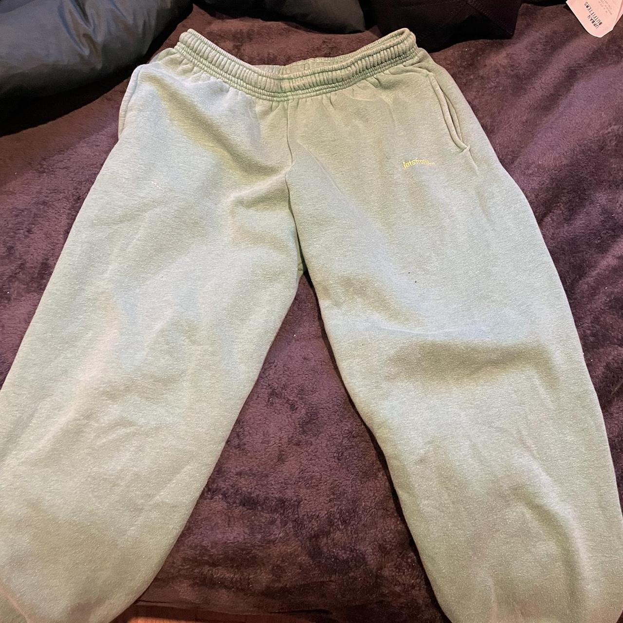 lime green Urban Outfitters sweatpants. has stains.... Depop