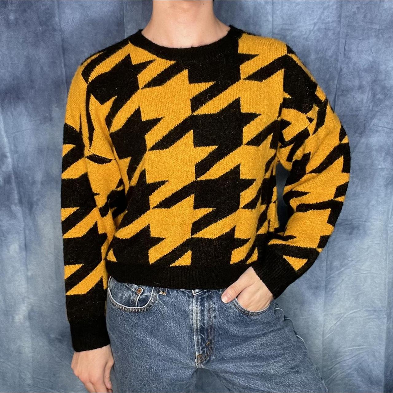 Black and 2024 yellow jumper