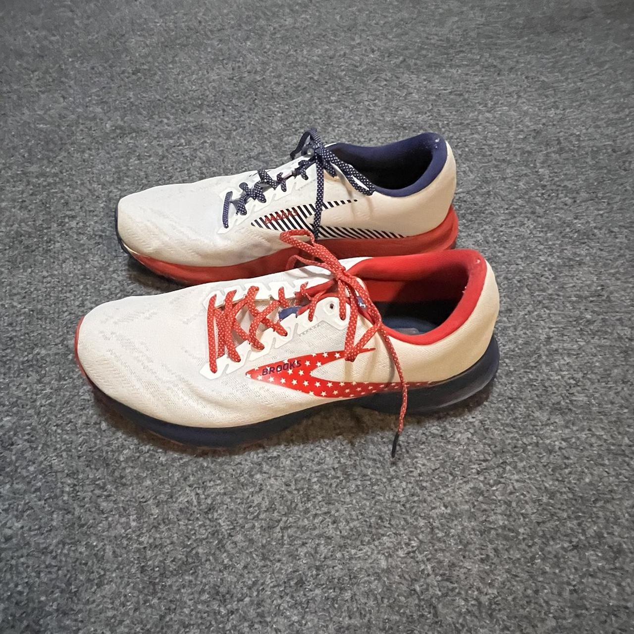 Brooks red store white and blue