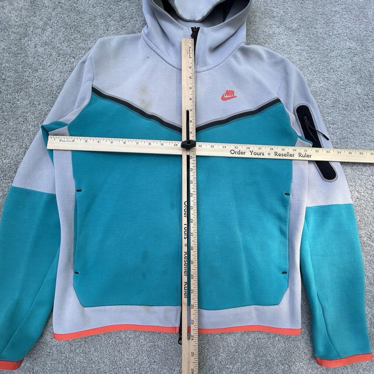 blue grey orange nike tech