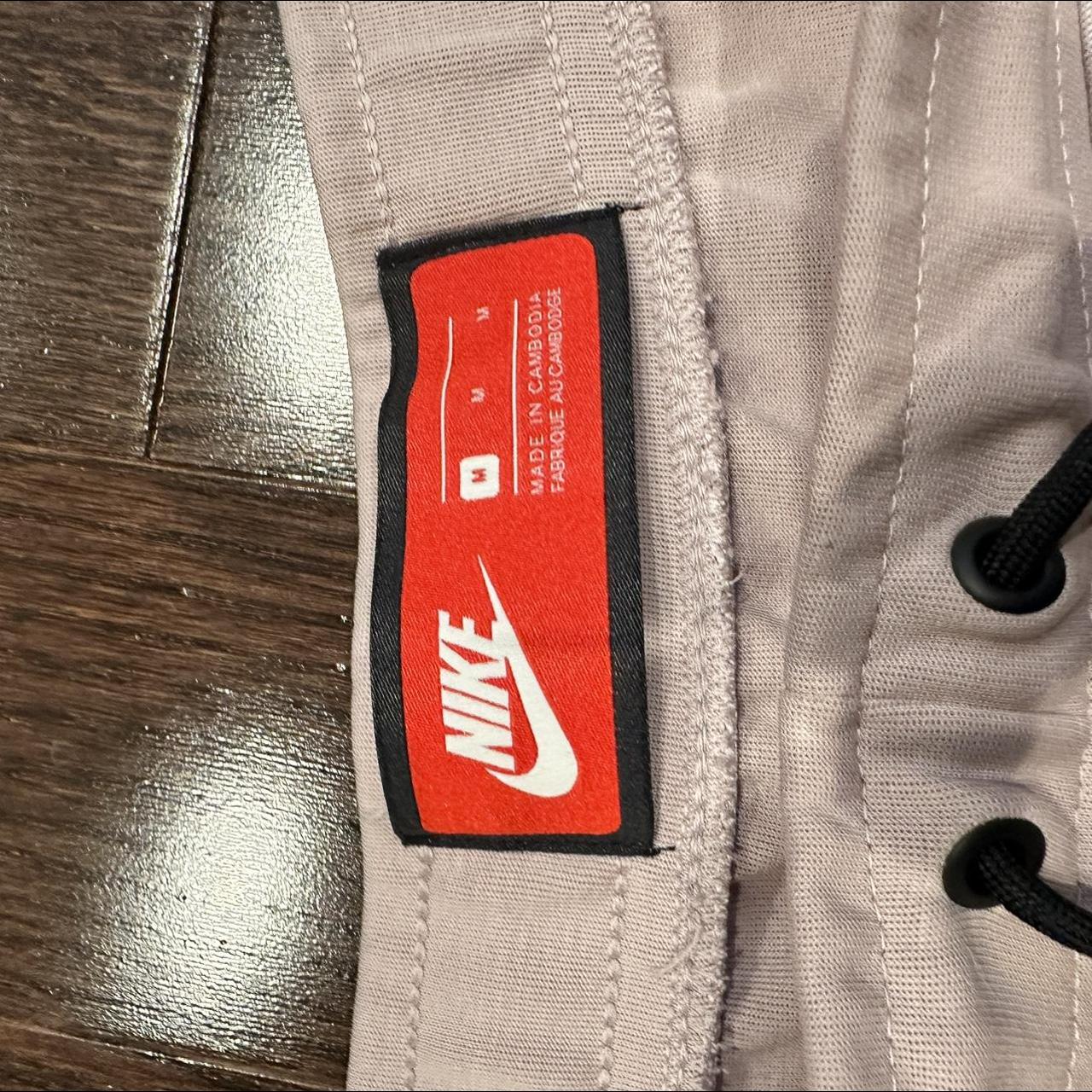 mens pink nike fleece shorts