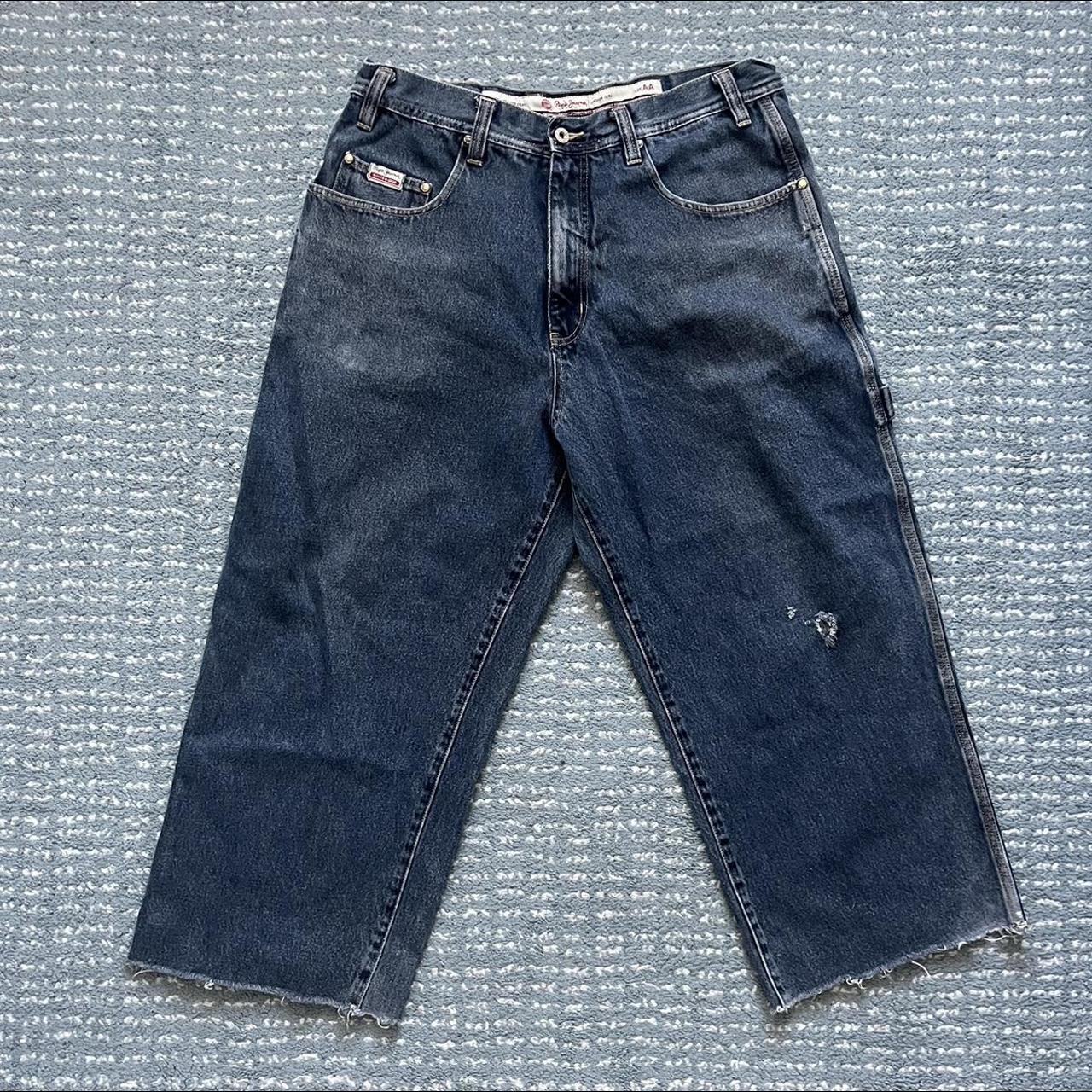 Pants are cut at the cuff, small hole near the knee... - Depop