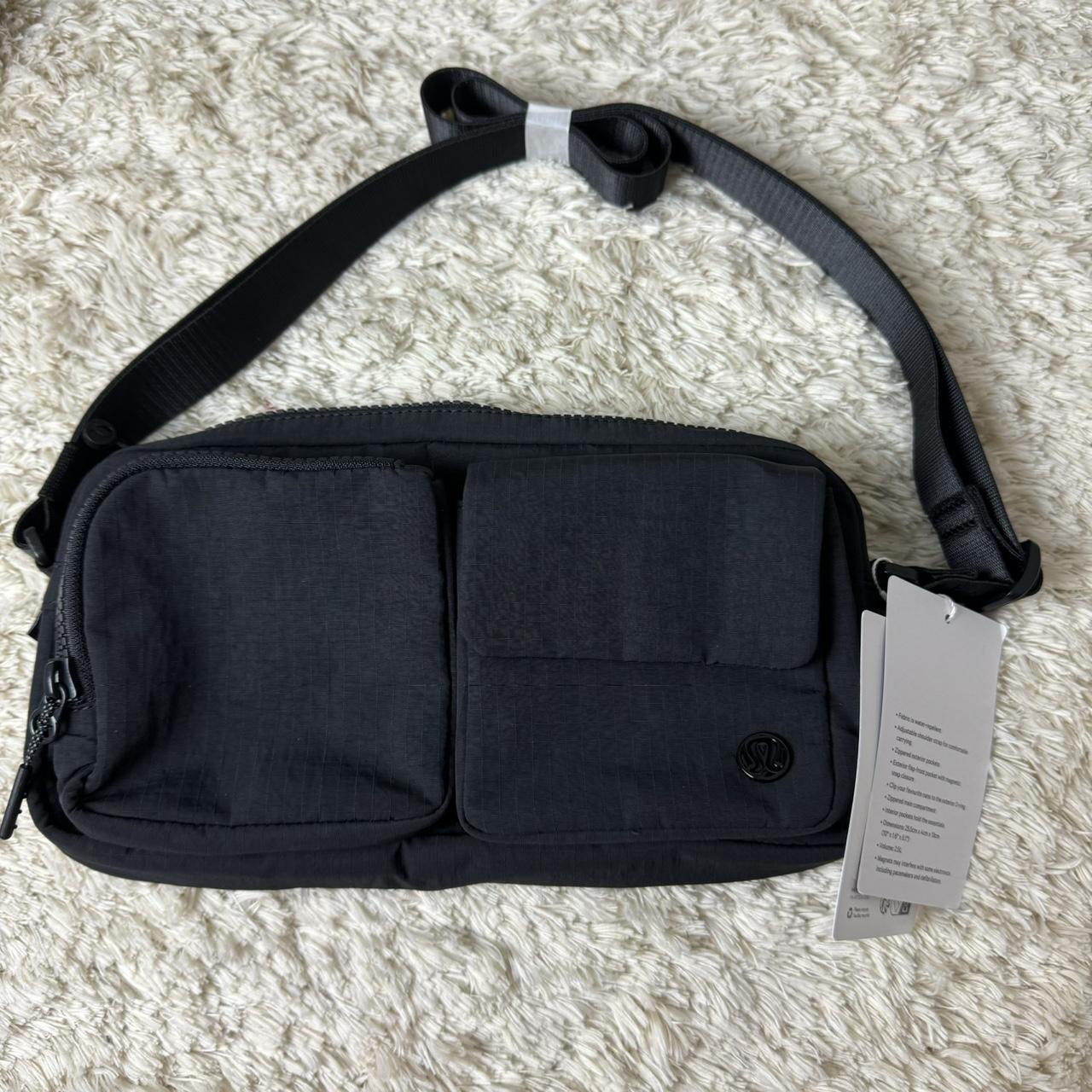 Lululemon Multi pocket Black crossbody bag size... - Depop