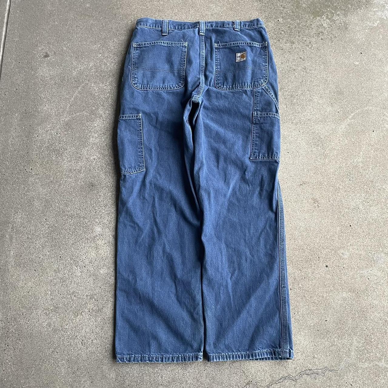 Vintage Carhartt fire resistant carpenter jeans Size... - Depop