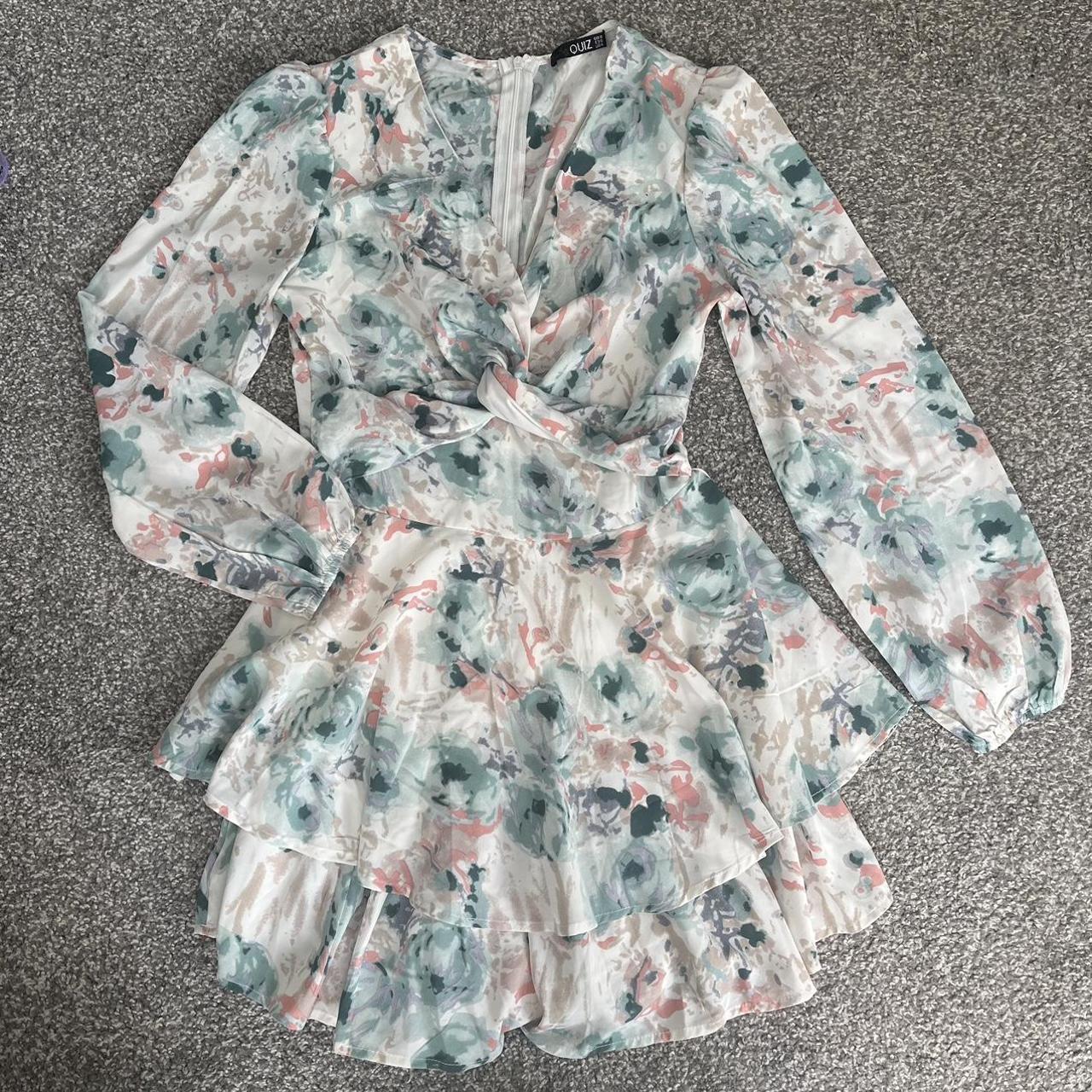 Size 8 Floral Playsuit from Quiz. Only worn once -... - Depop