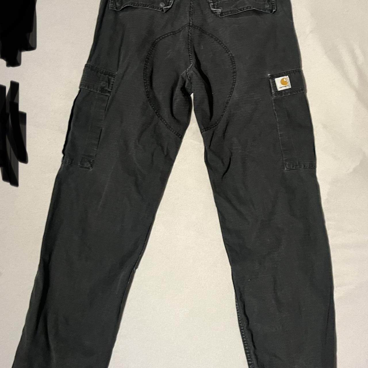 Carhartt Wip Black Cargos (used) Size: 33x34 - Depop