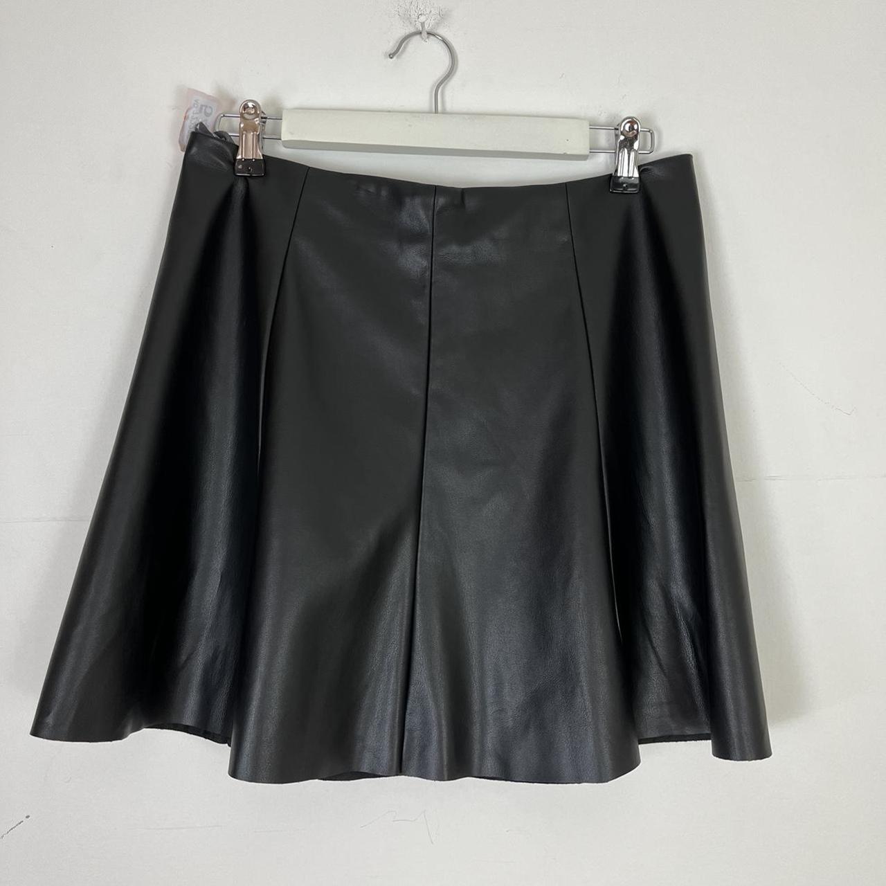 O545 Black pleather pleated mini skirt Size 14... - Depop