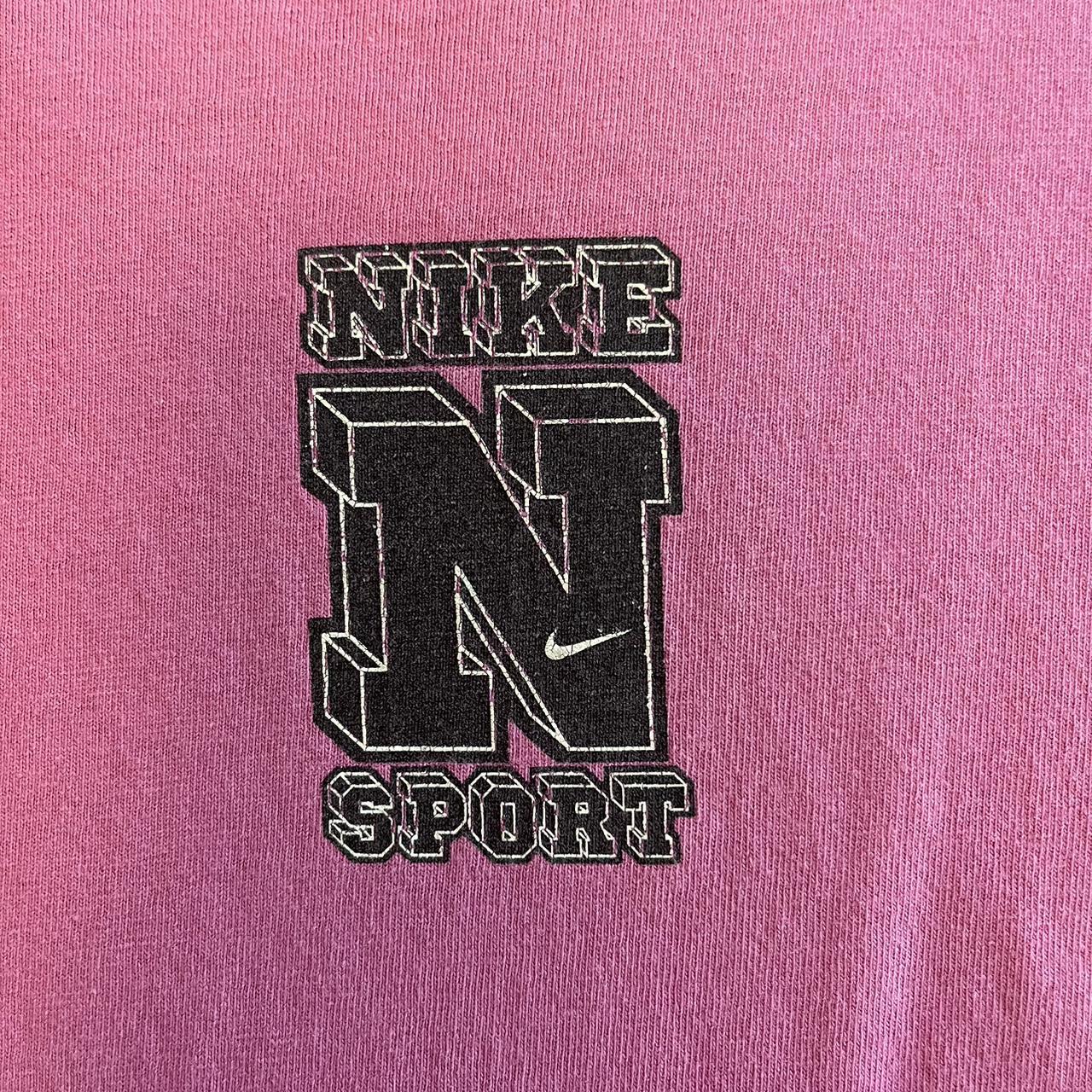 pink nike logo t shirt